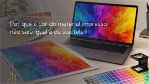 Tela de computador e material impresso mostrando a diferença de cores entre RGB e CMYK na impressão.
